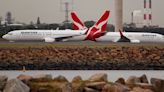 Australia's Rex cuts flights, blames rivals including Qantas of 'pillaging' pilots