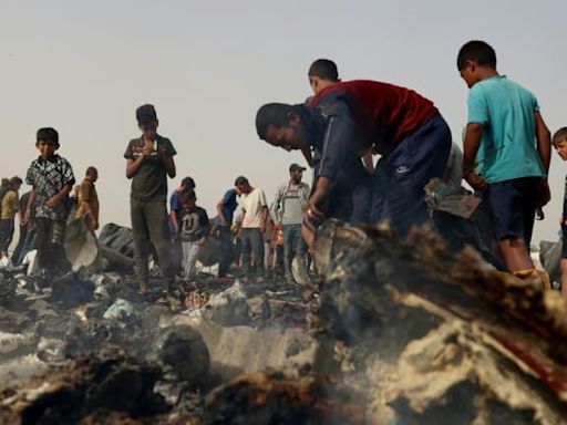 Israel faces outcry over Rafah strike that set tent city ablaze