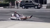 Atlanta resident floats down flooded street as city enters day five of water main breaks