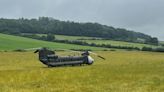 RAF working to repair helicopter stuck in field