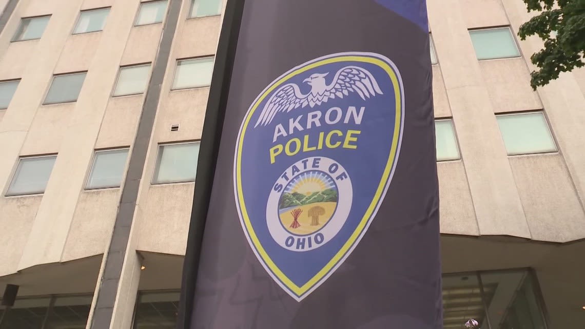 Akron police: Suspect charged with murder after man was shot, crashed into pole