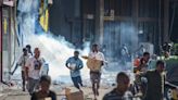 At least 15 dead as rioting and looting spreads across Papua New Guinea capital amid protests on pay cut