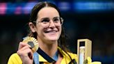 Australia's McKeown roars back to retain 100m backstroke gold