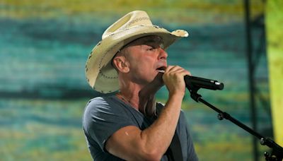 Kenny Chesney 'devastated' after woman falls off escalator and dies at the end of his concert