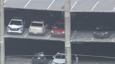 Woman in custody after man shot in west Houston parking garage, HPD says