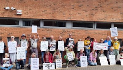 Why people were sat outside Swansea Crown Court holding signs saying 'Stop Jailing Truth Tellers'