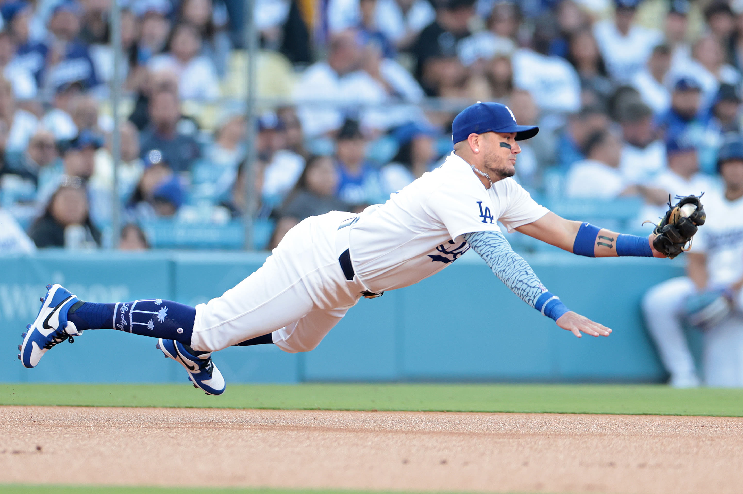 The Sports Report: Dodgers surge past the Rangers