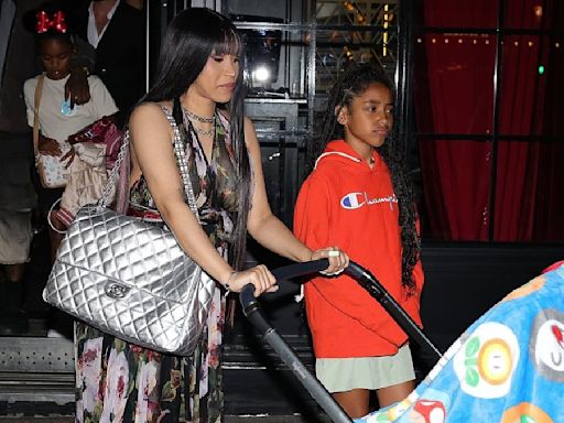 Cardi B sports a huge $12K Chanel bag and pushes a $4.6K Dior pram