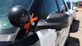 Why is TPD putting orange ribbons on patrol vehicles?