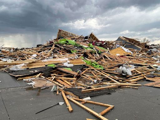 Devastating tornadoes rip through Nebraska and Iowa, sending crews searching flattened homes as storm threat continues