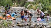 Cool, gentle Tujunga stream draws masses. Piles of waste, traffic, illegal parking follow