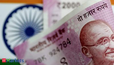 Rupee ends little changed after touching record low; budget in focus