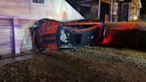 Car comes to rest against garage in Westmoreland rollover crash