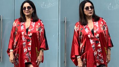 Neena Gupta in black lace dress layered with red floral robe and black boots proves that style has no age bar