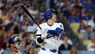 Dodgers hit four first-inning homers, outslug Cubs