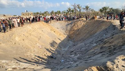 Dozens killed as Israeli strikes on Gaza humanitarian zone spark desperate search for buried victims