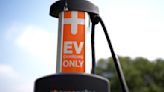 Many Americans are still shying away from EVs despite Biden’s push, an AP-NORC/EPIC poll finds