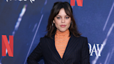 Jenna Ortega wears a see-through shirt and checked trousers for latest photoshoot