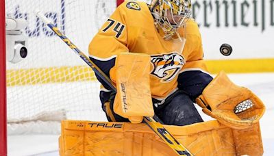 Predators, franchise goalie Juuse Saros agree to terms on an 8-year contract, AP source says