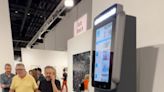 Art Basel: ATM at culture fair displays users’ bank balances on a leaderboard