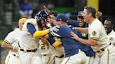 Victor Caratini's two-run single in the 11th inning sends Brewers home a winner against Dodgers