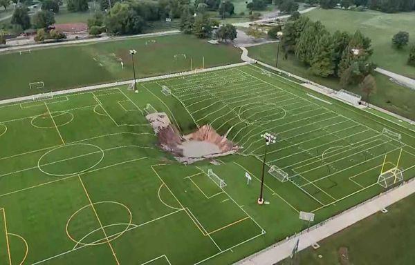 Massive sinkhole continues to grow after swallowing part of soccer field outside St. Louis