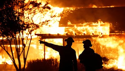 Man charged with starting massive wildfire in California as blazes burn across the West