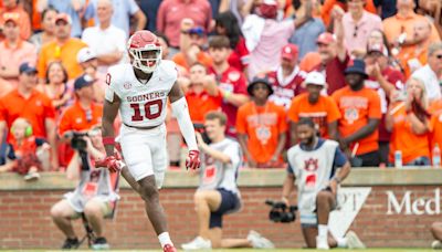 No. 21 Oklahoma gets pick 6 from Kip Lewis to finish comeback win over Auburn