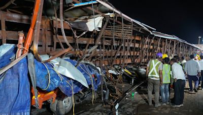 Billboard collapses onto people in Mumbai, India, killing at least 14 but others may be trapped