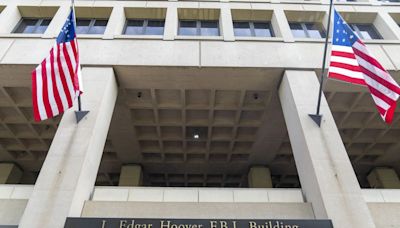 After two years, FBI relents on whistleblower’s pay, clearance