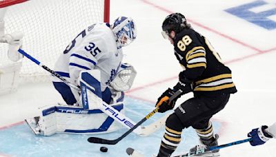 David Pastrnak scores in overtime to lift Bruins to Game 7 win over rival Maple Leafs