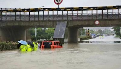 汨羅江水位70年新高！居民被沖進地下停車場 湖南媒體中心淹慘