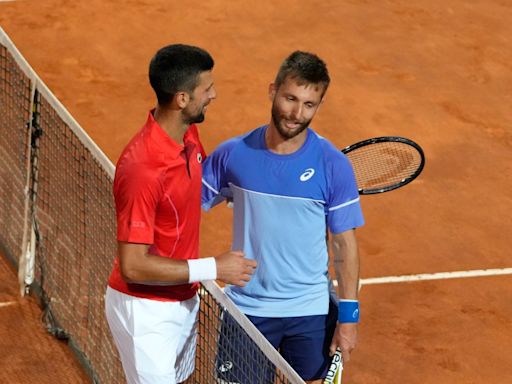 Djokovic says he’s ‘fine’ after being hit on the head by a water bottle