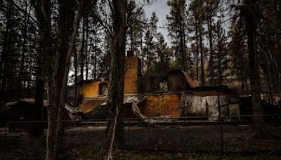 Rainfall, flooding halts crews fighting Ruidoso fires