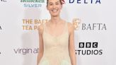 Rosamund Pike Is Dreamy in a transparent Corset Gown Adorned With Fresh Roses at the BAFTA Tea Party