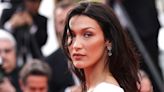Bella Hadid poses topless with lavender flowers in a dreamy photo shoot