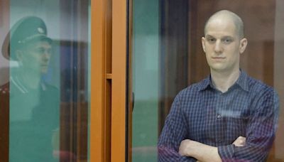 Evan Gershkovich: US journalist seen with shaved head as he goes on trial in Russia for spying