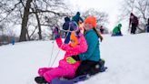 As the snow falls, a few public sledding hills await your family fun