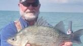 Man catches "monstrous" record-breaking white perch in Michigan