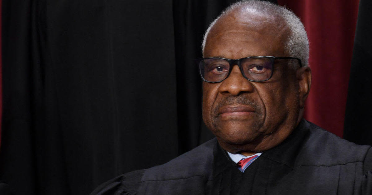 Justice Clarence Thomas took undisclosed trip aboard Harlan Crow's private jet in 2010, senator says