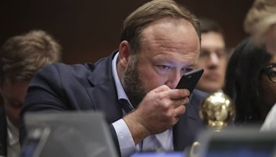 Infowars conspiracy theorist Alex Jones asks court to allow conversion of his bankruptcy into liquidation