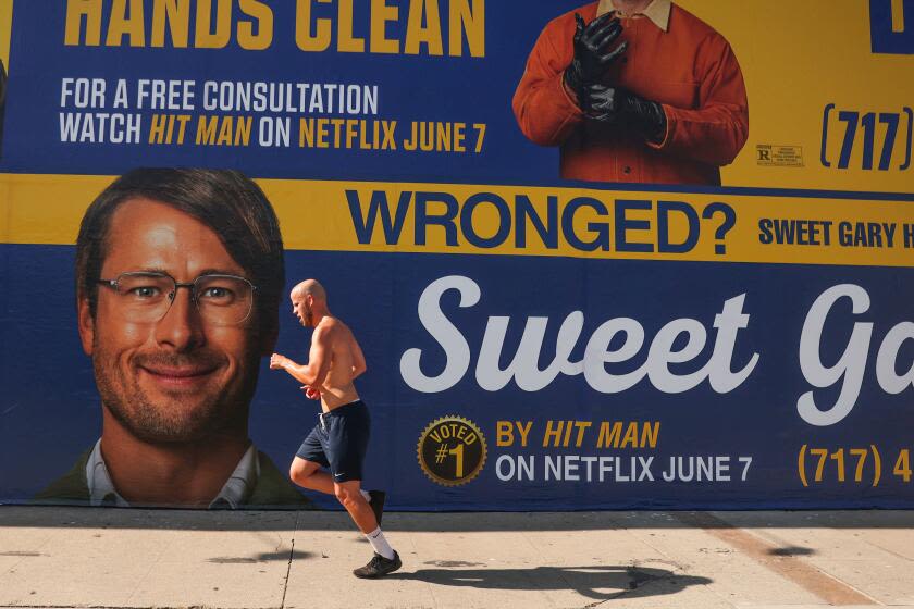 Need a 'Hit Man'? Netflix spoofs L.A.'s famous lawyer billboards to market new movie