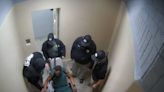 Officer uses chain to strangle man in solitary confinement as guards watch, lawsuit says