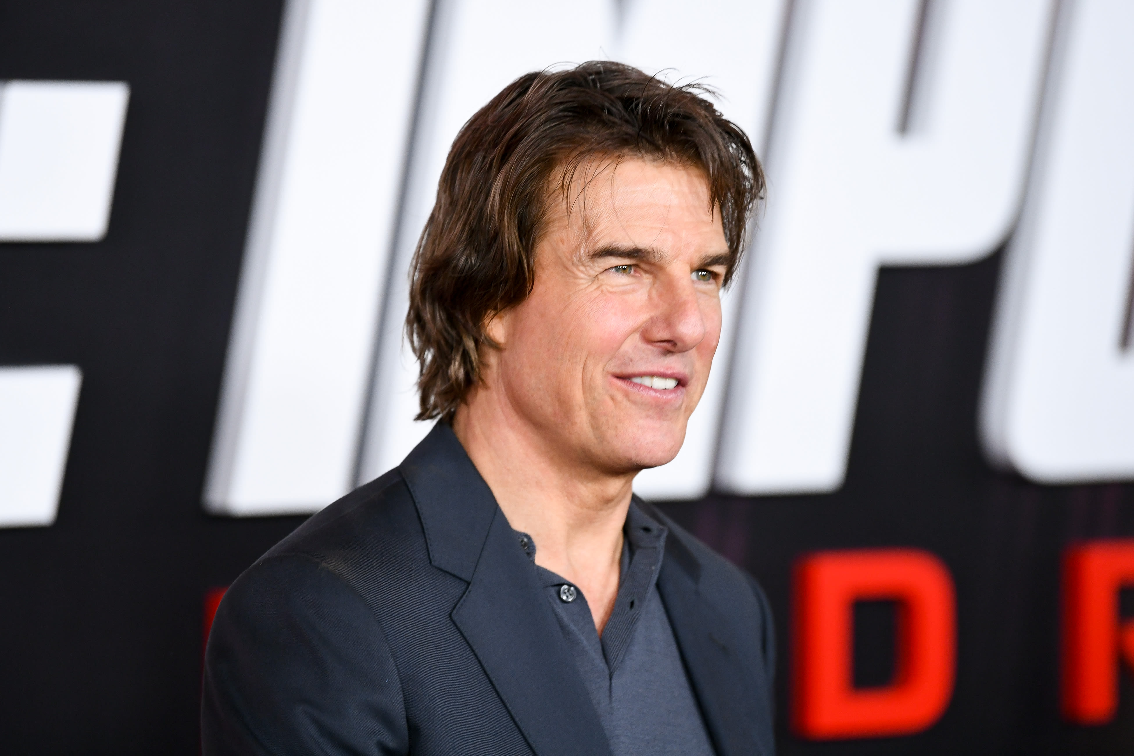 A Rare Photo of Tom Cruise With His 2 Oldest Kids Gives a Glimpse Into Their Relationship With Their Dad