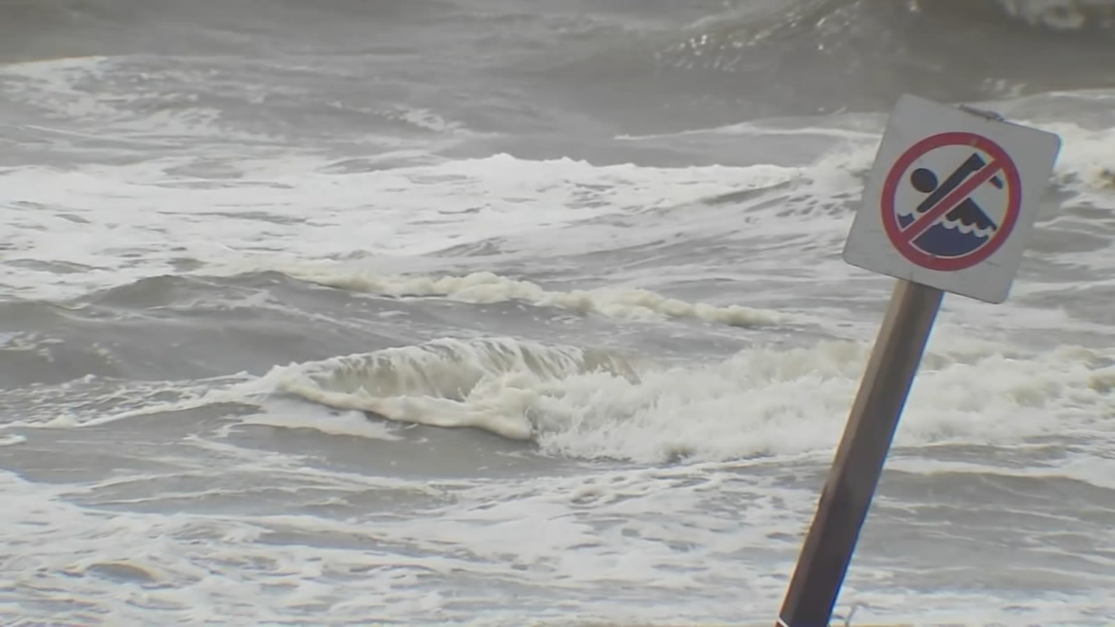 Red flags fly across Galveston beaches as Gulf storm heads inland