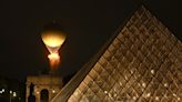 Paris dazzles with a rainy Olympics opening ceremony on the Seine River