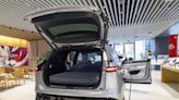 China EV Makers Woo Buyers With In-Car Beds, Kitchens and Drones