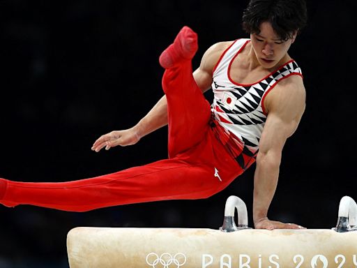 Gymnastics-Bathwater mishap forces Japan's Oka to swap cardboard bed