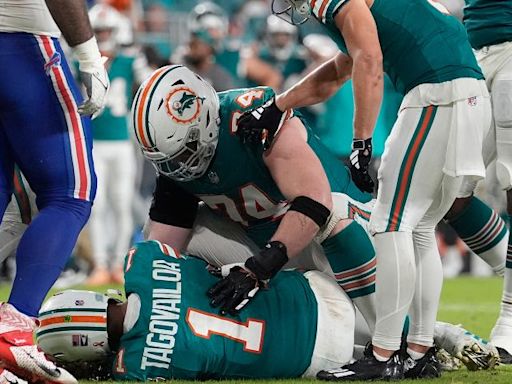 Dolphins quarterback Tua Tagovailoa suffers concussion after collision with Damar Hamlin in loss to Bills