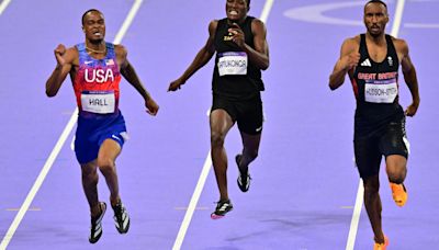 USA's Quincy Hall passes 3 runners in final stretch to win gold medal in Olympic 400 meters